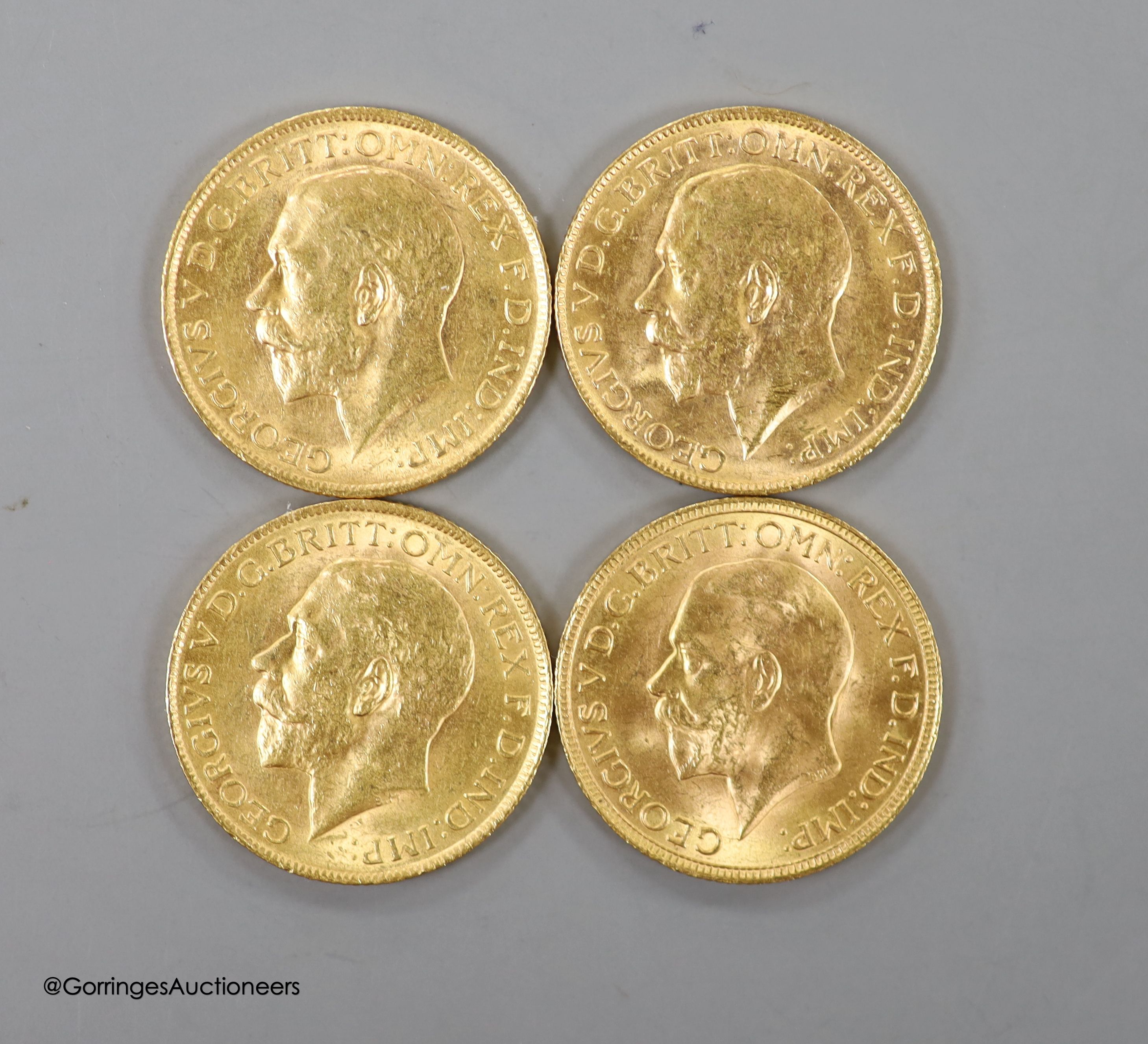 Four George V gold sovereigns, 1913, 1915, 1922P and 1931SA